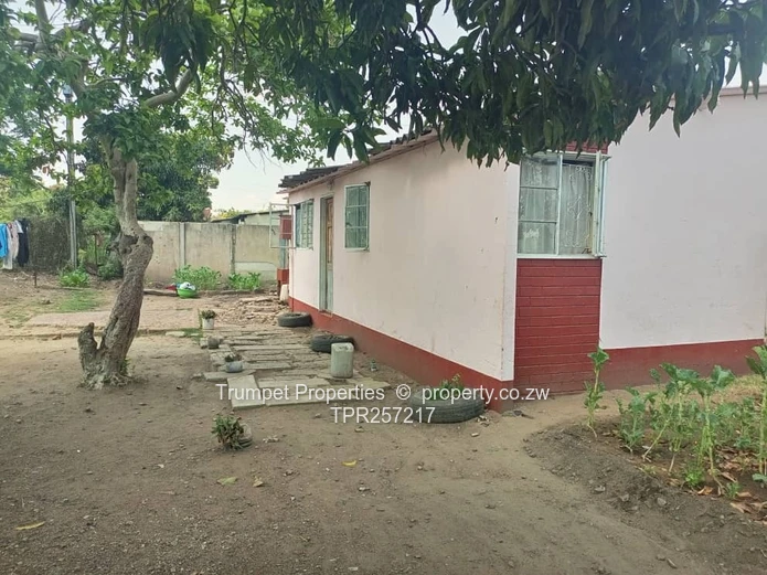 Painted 2-Bed Mufakose Home with Shaded Yard