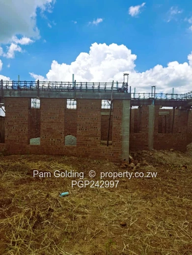 Stand with Partially built 3 Bed House