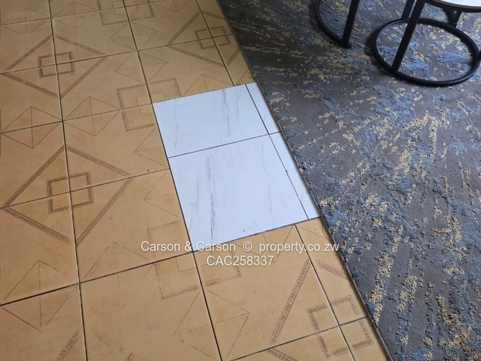 Mufakose 2 bedroom flat lounge fitted kitchen combined toilet and bathroom on ground floor 