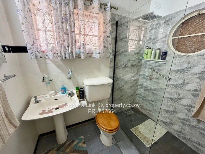 Double Entrance Corner Property With Potential!