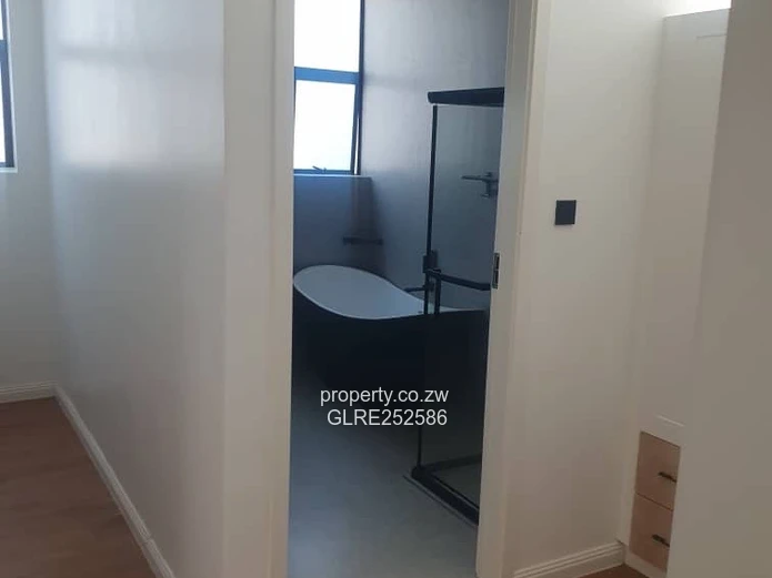 Modern Gated 4-Bed House in Harare North - Borehole