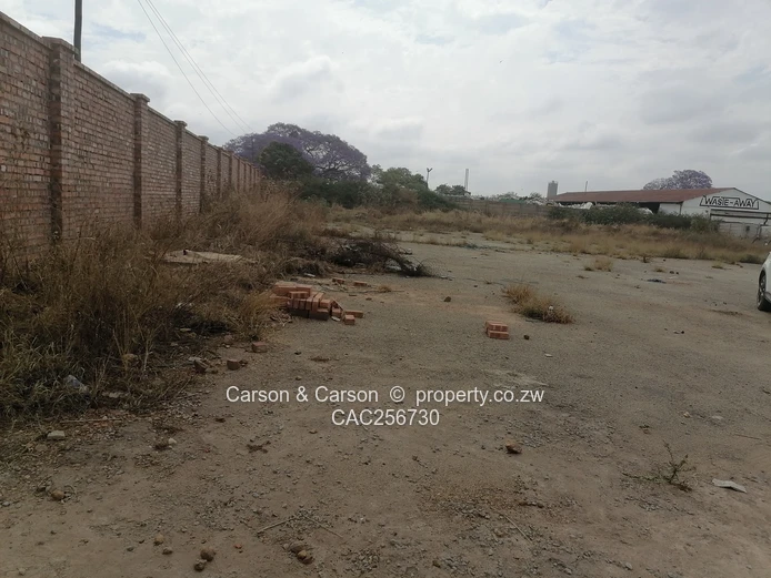 8001m² Walled Commercial Land — Main Road, Ardbennie, Harare South