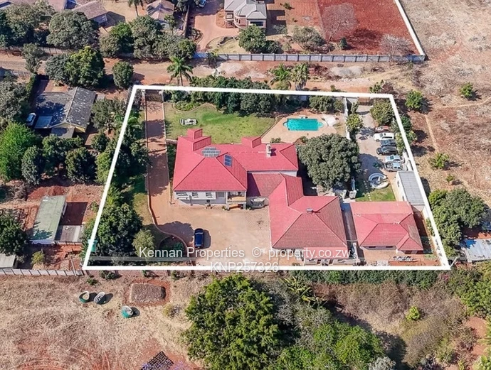  Charming 7 Bedroom Double Storey Home with a 5 Bedroom Cottage on 1 Acre