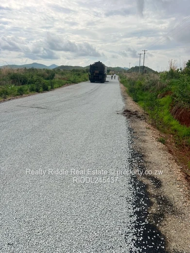 1250m² Bindura Stand — Tar Road, Water Tanks & Views