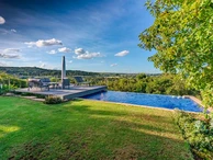 This magnificent property is one of a kind and well-worth a view!