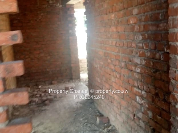 Partly Built 6-Bed Brick Shell on 1200m² Zimre Park