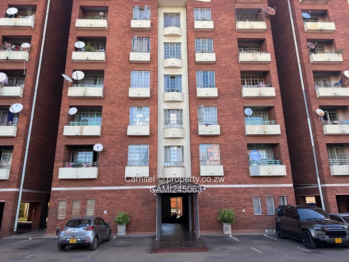 Chinamano Heights:Parquet-Floored 2-Bed Avenues Flat with Borehole (Sole Mandate)