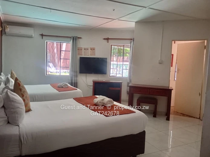 Ten bedroomed lodge under thatch for sale 