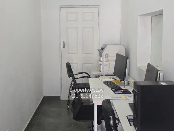 Harare CBD Office: Secure Walled Property with Paved Yard