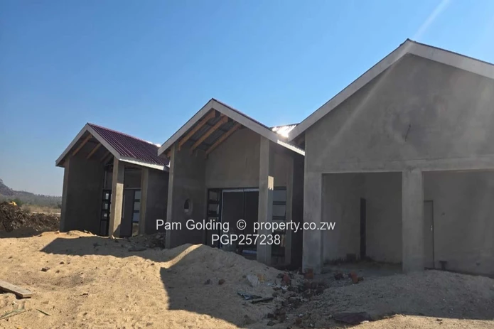 Low density residential stands next to a game park (Sole Mandate)