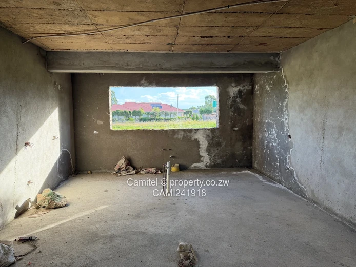 Incomplete 4 Bed double storey with a 3 bed cottage with title deed