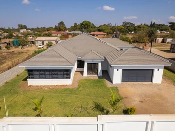 Elegant And Spacious Modern Home On Half An Acre