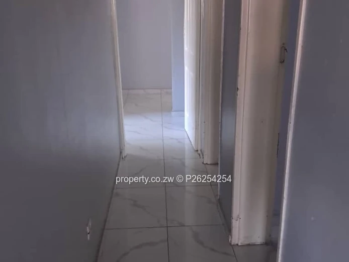 A four bedroomed house for sale in Mainway Meadows, Waterfalls in Harares