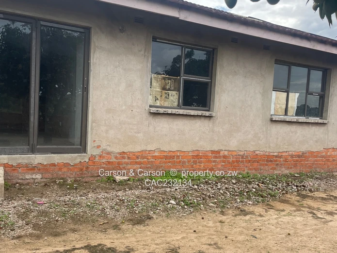 Walled 3-Bed Home with Verandah & Main Road Frontage