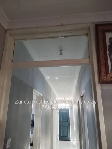 4-Bed, 2-Bath Manyame Park Home — Tiled Hallway & Carport