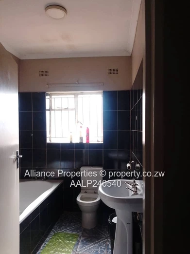 Spacious 4-Bedroom Home with Solar System on 450sqm – Walled & Gated