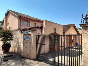Charming 4-Bedroom Townhouse Complex with Borehole in Avenues, Harare