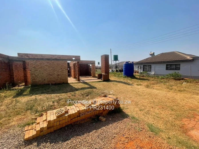 Spacious 2,000m² Corner Stand with Incomplete Multi-Unit Development