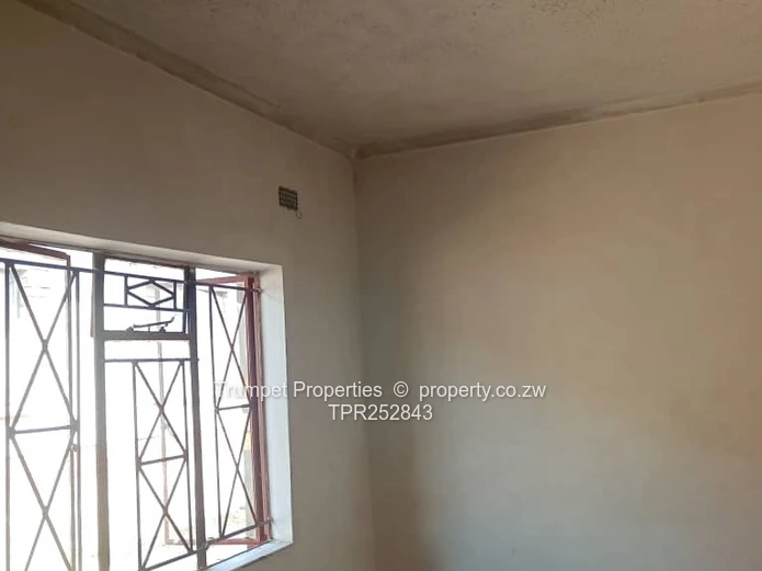 Spacious 4-Bed Brick Home with Verandah & Garage