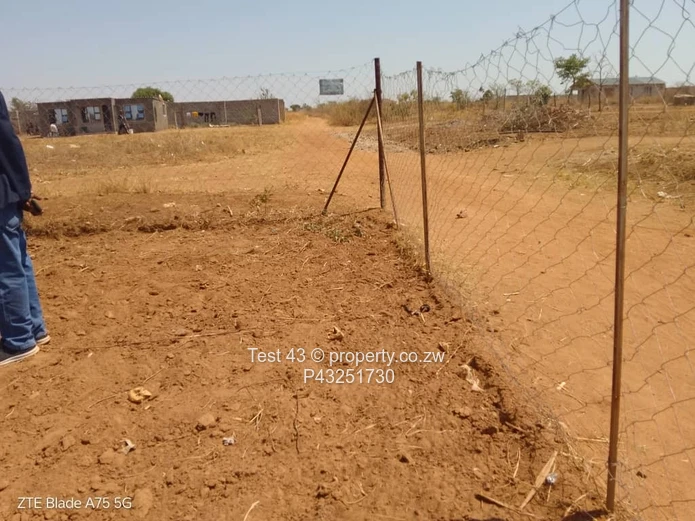 2500m² Fenced Red-Soil Plot in Seke — Ready to Farm