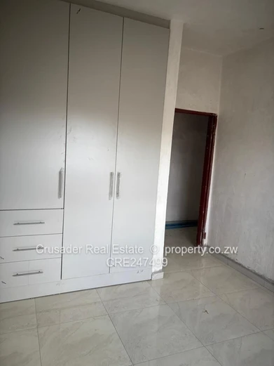 Modern 2-Bed Flat in Tynwald — Borehole & Built-ins (Sole Mandate)