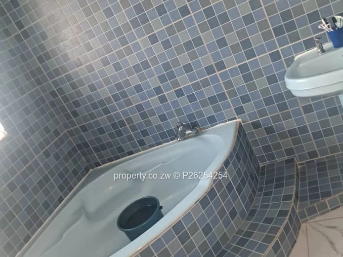A four bedroomed house for sale in Mainway Meadows, Waterfalls in Harares
