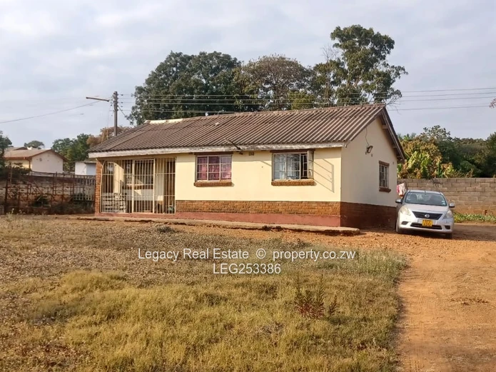 Walled 2-Bed Home on 2300m² with Verandah & Main Road Frontage (Sole Mandate)