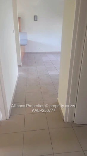 Spacious 2-Bed Ground Floor Flat with Borehole & Garden