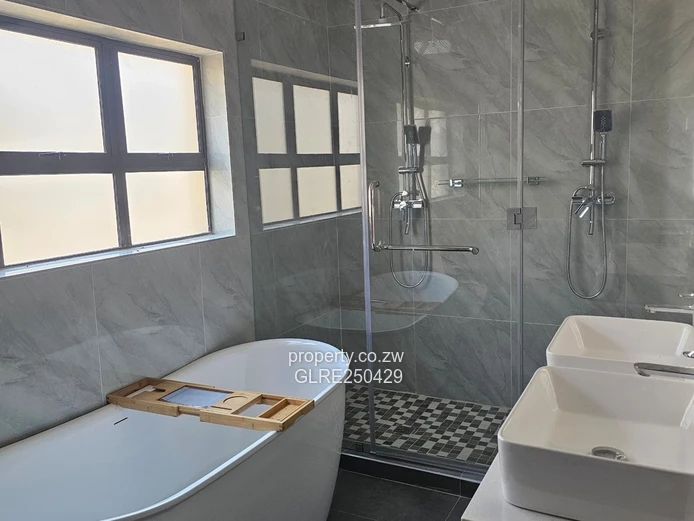 Stylish 3-Bed, 3-Bath Ashbrittle Home with Borehole