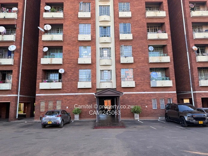 Chinamano Heights:Parquet-Floored 2-Bed Avenues Flat with Borehole (Sole Mandate)