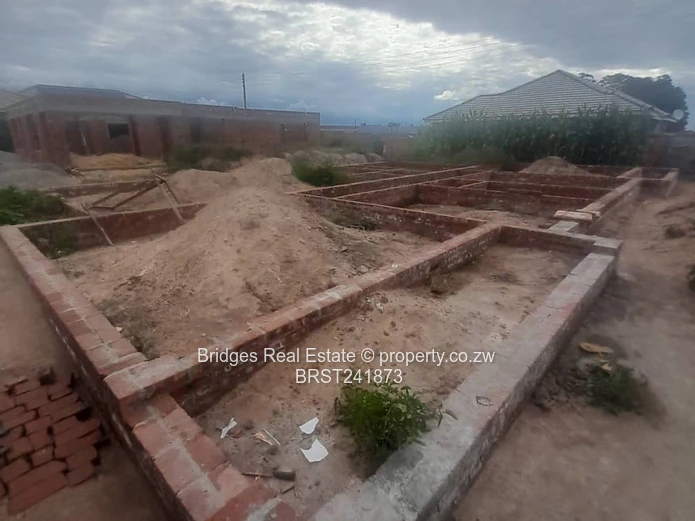 Serviced Residential Stand for Sale with Unfinished Structure