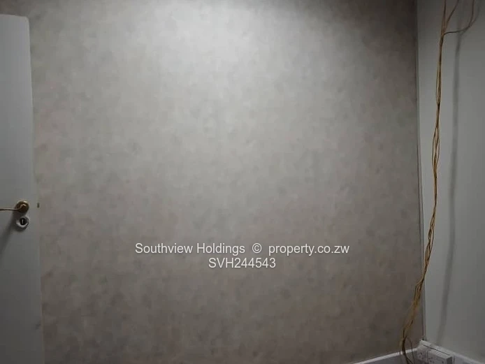 Neat office to let, Upper CBD. Gross rent USD210.00 per month.