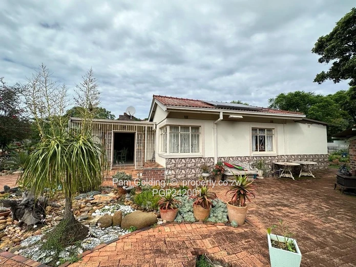 Charming, Compact Residence Set On Spacious Land