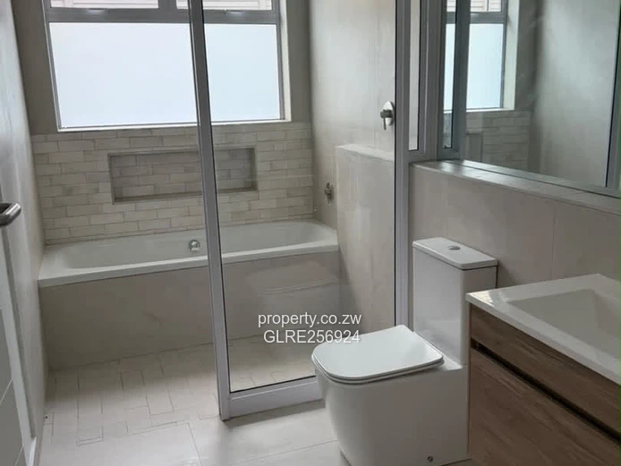 Modern 3-Bed Flat in Borrowdale with Verandah & Solar