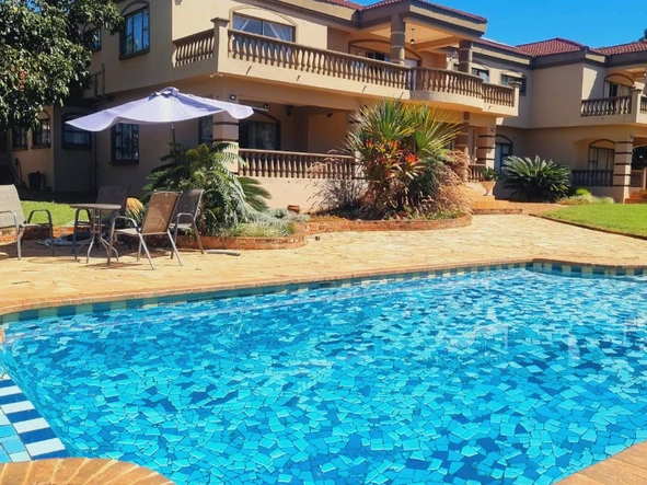 Luxurious 7-Bedroom Furnished Home with Pool in Borrowdale