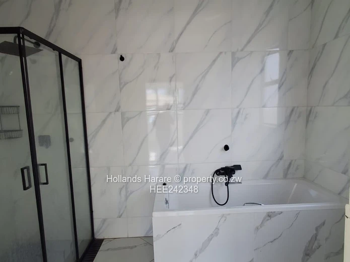 Beautiful modern Cape Dutch style home in a secure estate close to Food Lover’s Market Greendale