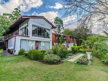Family home in Glen Lorne with views and trees!