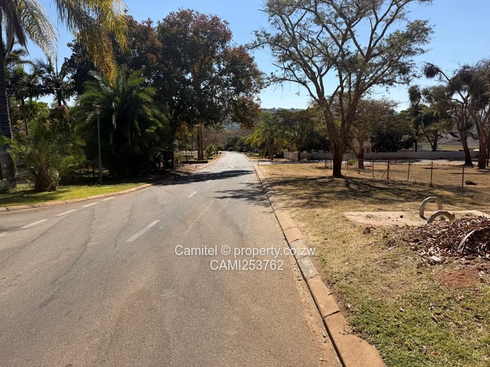 6005 sqm Stand, Borrowdale Brooke inside the boom gateTarred, Tree-Lined Main Road