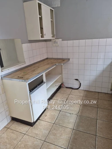 Harare CBD Avenues: 2-Bed Flat 80sqm — Borehole & Paved Yard (Sole Mandate)