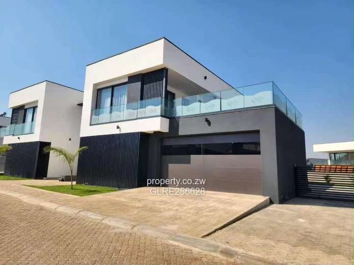 Borrowdale: Modern 4-Bed Apt w/ Glass Balconies & Borehole