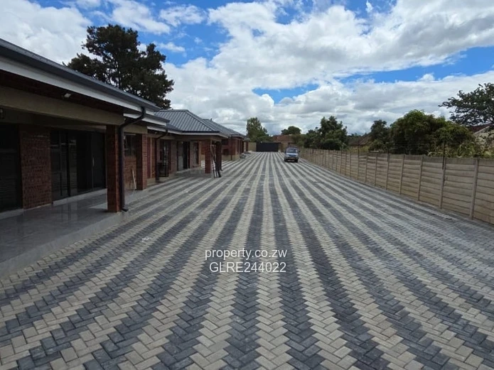 Paved Red-Brick 2-Bed Home with Borehole in Mabelreign