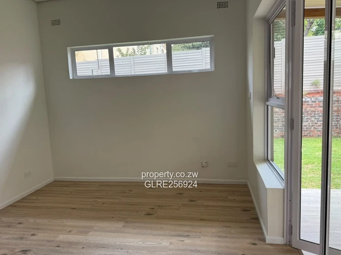Modern 3-Bed Flat in Borrowdale with Verandah & Solar