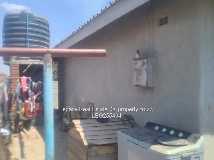 Walled 4-Bed Budiriro Home with Iron Gates & Borehole
