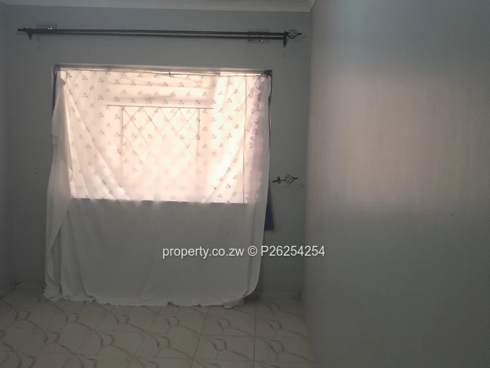 A four bedroomed house for sale in Mainway Meadows, Waterfalls in Harares