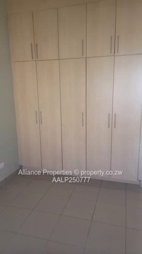 Spacious 2-Bed Ground Floor Flat with Borehole & Garden