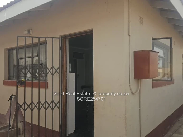 Reigate 3BR Brick Home with Borehole & Checkerboard Courtyard