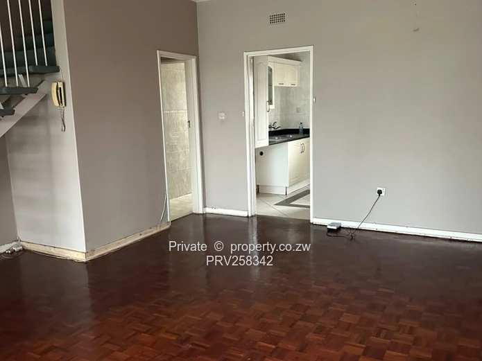 Kensington 2-Bed Flat 40m2 — Borehole & Secure Garden