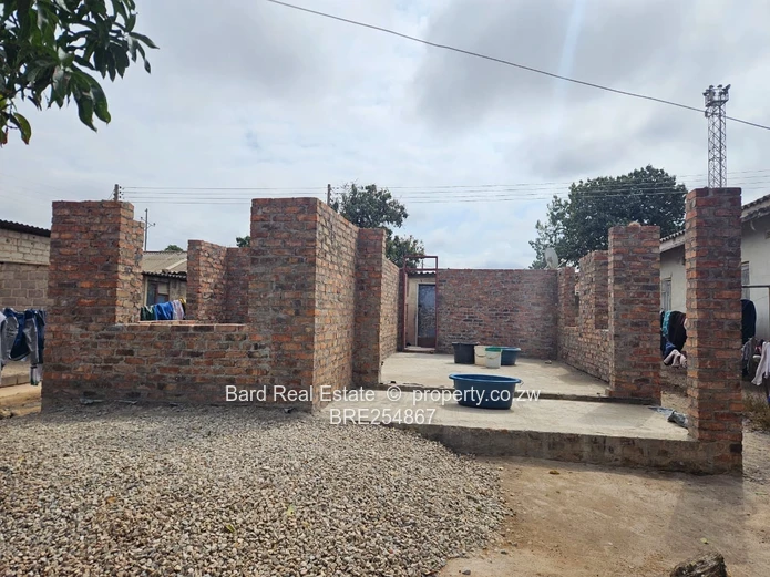 4-Bed Unfinished Brick Shell in Seke - Garden & Verandah