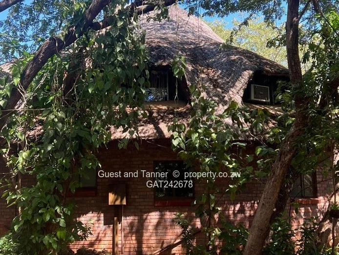 Ten bedroomed lodge under thatch for sale 