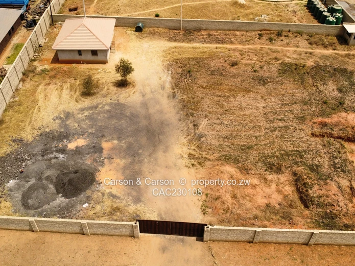 Walled 2568m² Stand on Gravel Road — Chitungwiza (Sole Mandate)